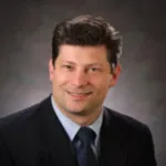 Dr. Kevan Gerard Lewis, MD