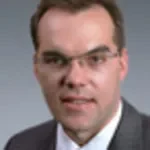 Dr. Lance E. Oxford, MD