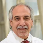 Dr. Louis E. Samuels