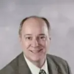 Dr. Manuel E. Grinberg, MD, FACS