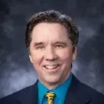 Dr. Mark E. Lewis, DO