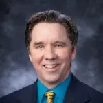 Dr. Mark E. Lewis, DO