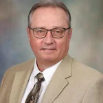 Dr. Mark K. Lyons, MD