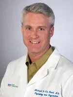 Dr. Michael James De La Hunt