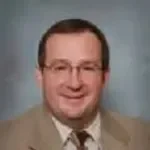 Dr. Michael  E. Roth, DPM