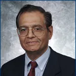 Dr. Mukund S. Didolkar, MD
