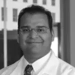 Dr. Nasser Razack, MD