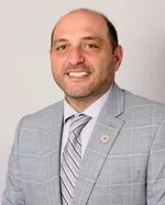 Dr. Nickolas E. Dawlabani, MD