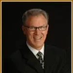 Dr. Thomas H. Risbrudt, DDS