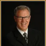 Dr. Thomas H. Risbrudt, DDS