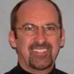 Dr. Tom C. Krejcie, MD