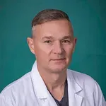 Dr. Tomasz Srokowski, MD