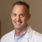 Dr. Travis Brown, MD