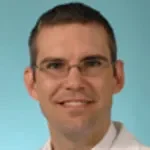 Dr. Travis J. Hillen, MD
