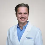 Dr. Troy Jesse Schumacher, MD
