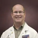 Dr. Warren G. Tourtellotte, MD