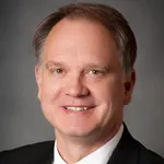 Dr. Wilford Keith Gibson, MD