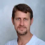 Dr. William Ely Burkhalter, MD