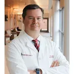Dr. William J. Symons, MD