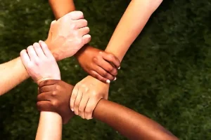 five-mixed hands clasped in unity